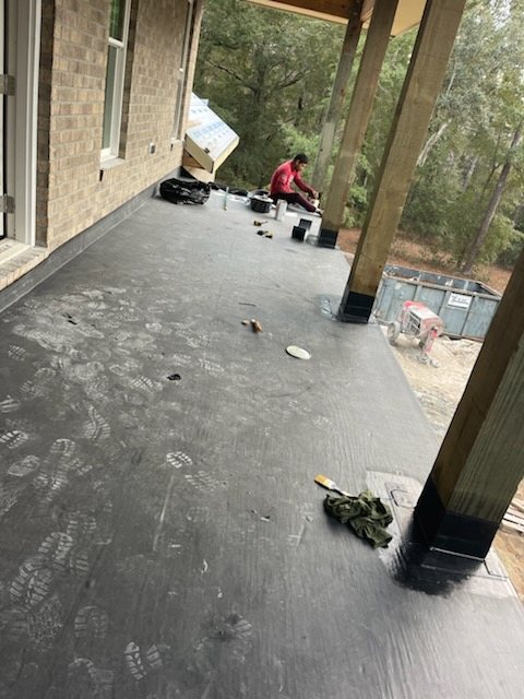 EPDM waterproofing membrane work on a covered Carolina Beach deck