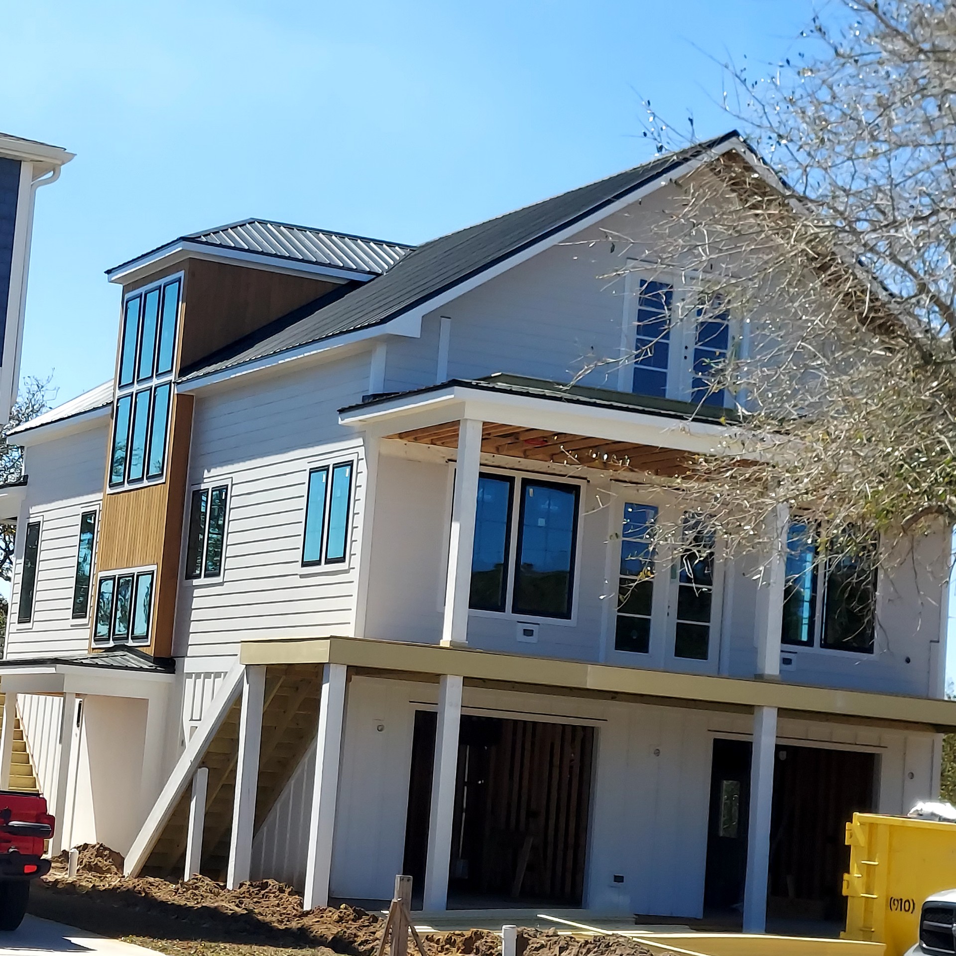 Coastal home roofline exterior view after roof work
