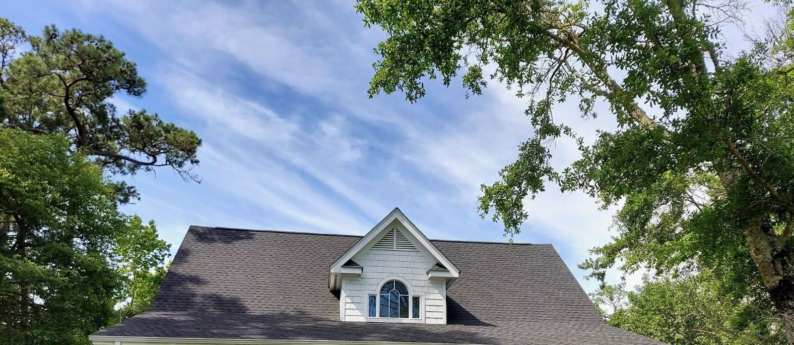 Finished architectural shingle roof on a residential home